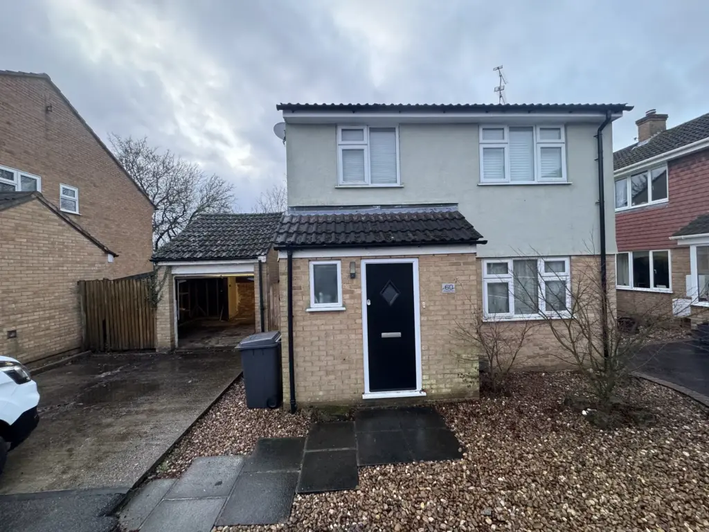 Home in Chelmsford before the second-storey link extension was built over the retained garage