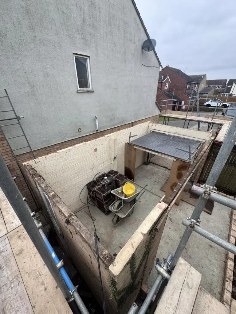 Foundation works beside the retained garage during a Chelmsford link extension build