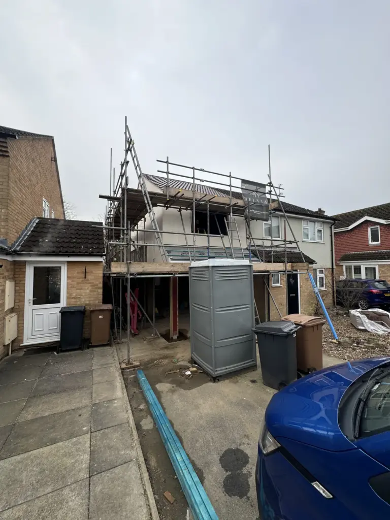 Roof works in progress on a second-storey link extension in Chelmsford