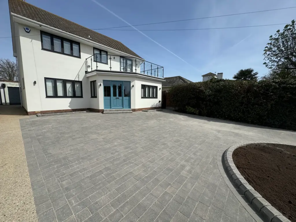 Wide shot of the completed block paved driveway and planting bed at a renovated home in Frinton-on-Sea