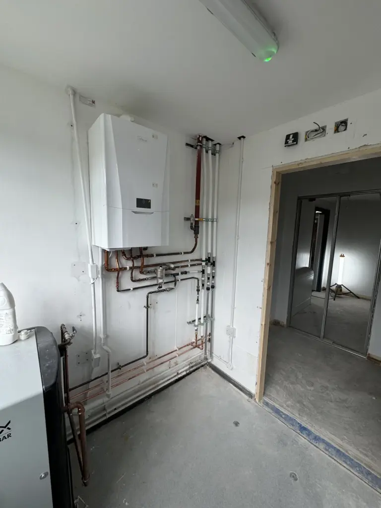 First-fix pipework in the plant room during The Hawthorns School washroom refurbishment in Chelmsford