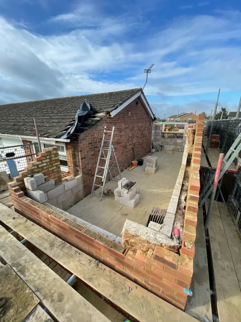 First-floor blockwork during the Kelvedon double storey side extension build