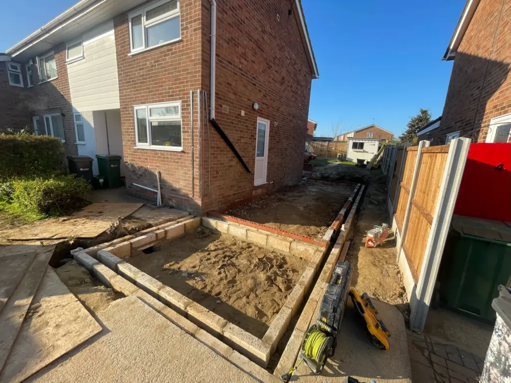 Front groundworks for an attached garage during a Kelvedon double storey side extension
