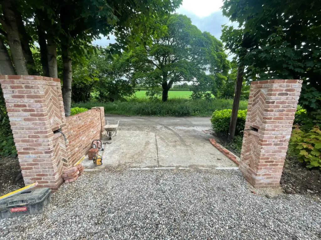 New brick entrance opening under construction at the Rivenhall property