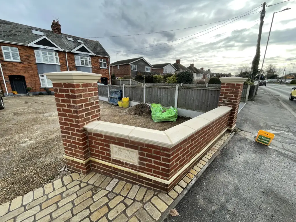 Brick entrance wall under construction at the Witham driveway project
