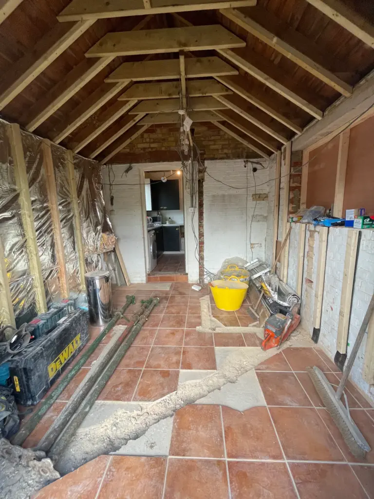 Looking back through the new opening to the original kitchen during first fix on this Witham refurbishment