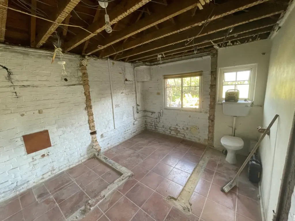 The outbuilding's original toilet and cistern before it was gutted and absorbed into the new Witham kitchen extension