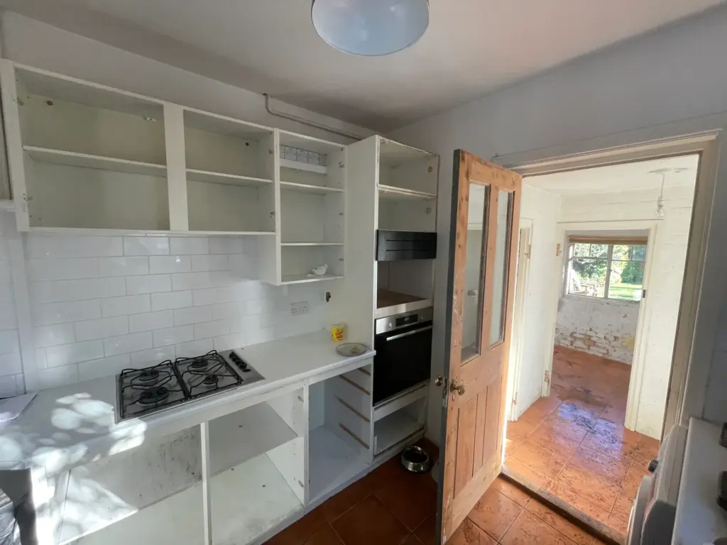 Emptied-out original kitchen units before the Witham ground floor refurbishment began