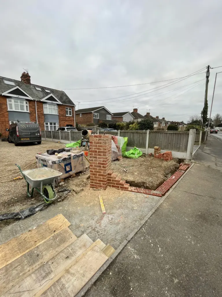 Sandstone cobble driveway apron being laid at the Witham entrance