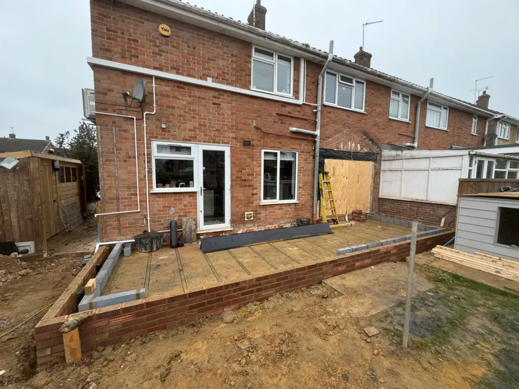 Brick footing course and DPC membrane going up on the Writtle extension foundations