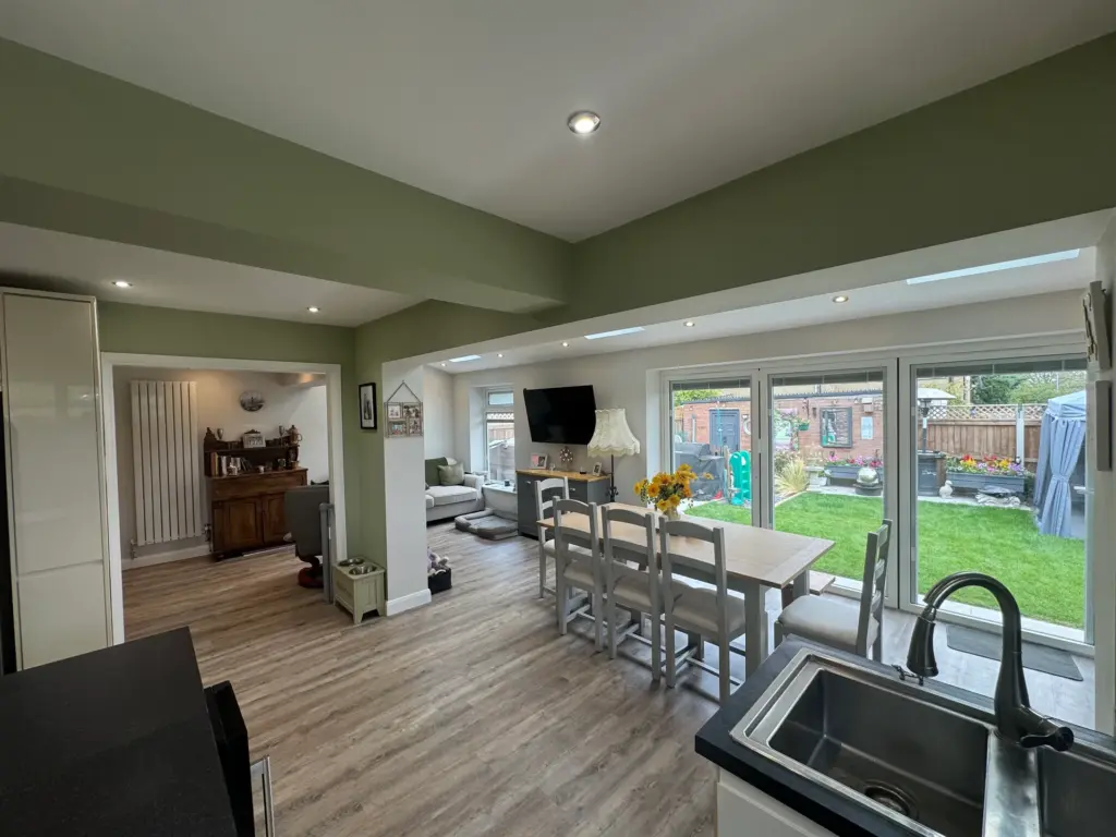 View across the furnished open-plan kitchen-diner and living space in the completed Writtle extension