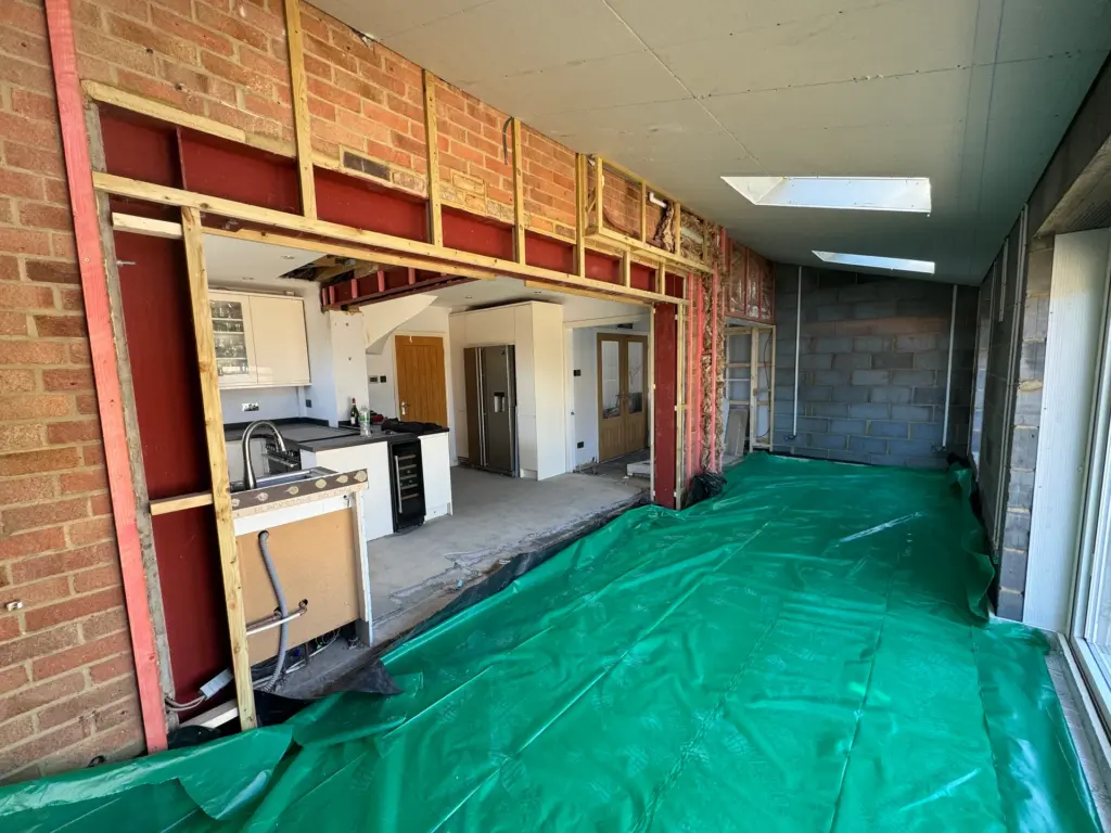 Framed structural opening with plasterboard ceiling and roof windows fitted in the new Writtle extension